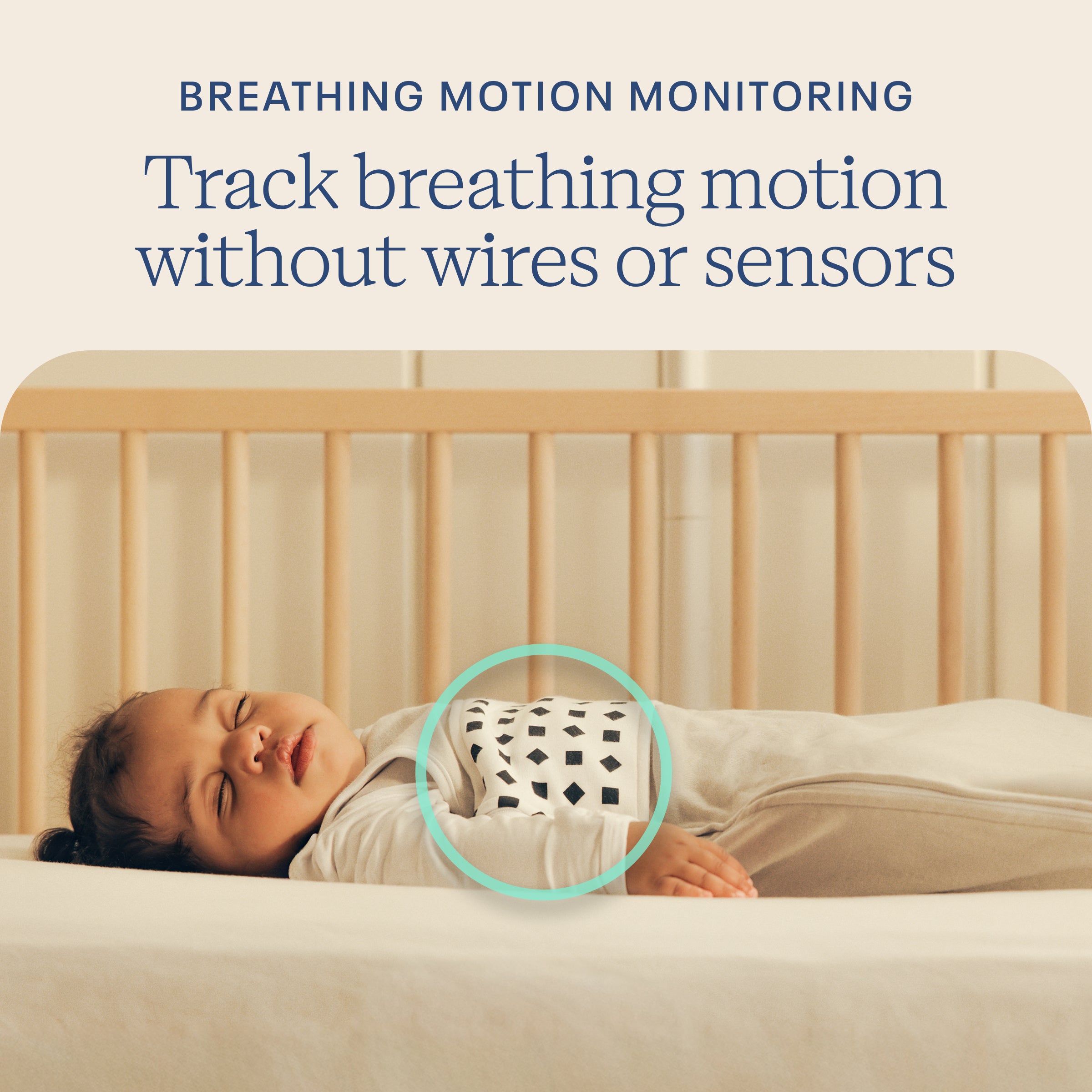 Baby lying in a crib with text about breathing motion monitoring without wires or sensors.